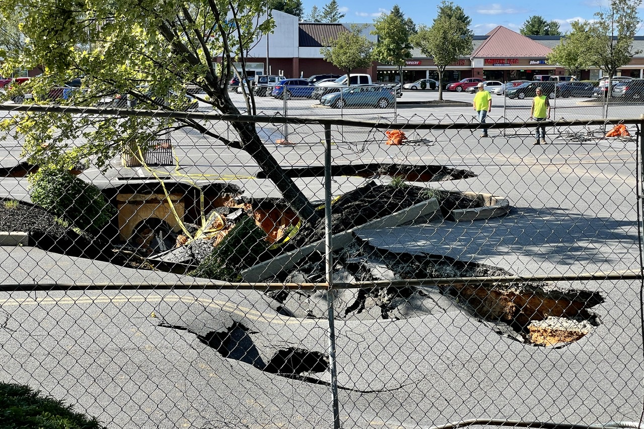 Video Flash Flooding causes Sinkhole in Berkshire Square Shopping Plaza