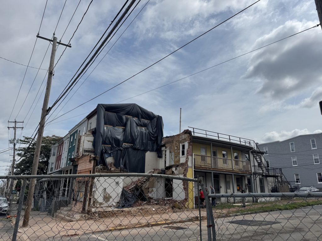 The three-story apartment complex at 501 North 8th St. in Reading remained fenced off July 18 after the south wall collapsed July 5.