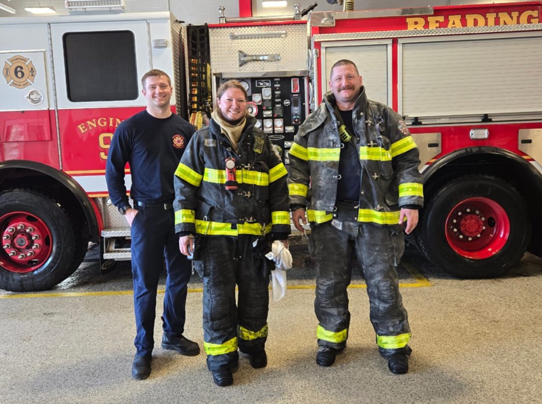 Reading Fire Department Lt. Rebecca Zentmyer, center, with two colleagues.