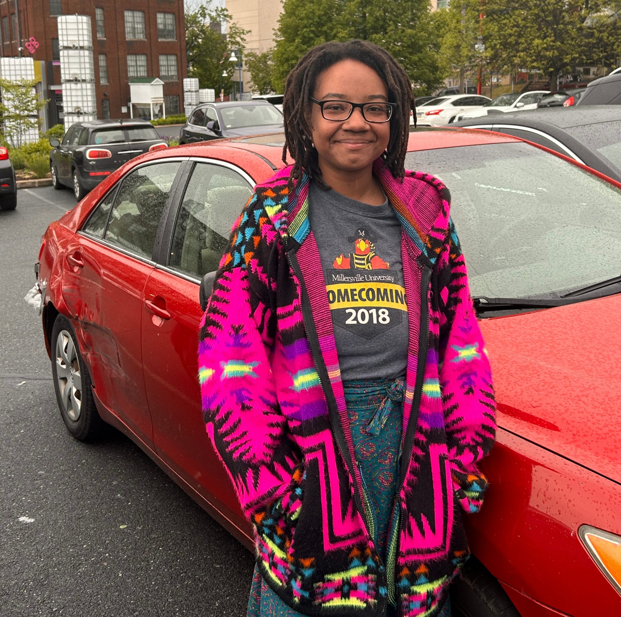 Cierra Mayo stands by her car in Reading